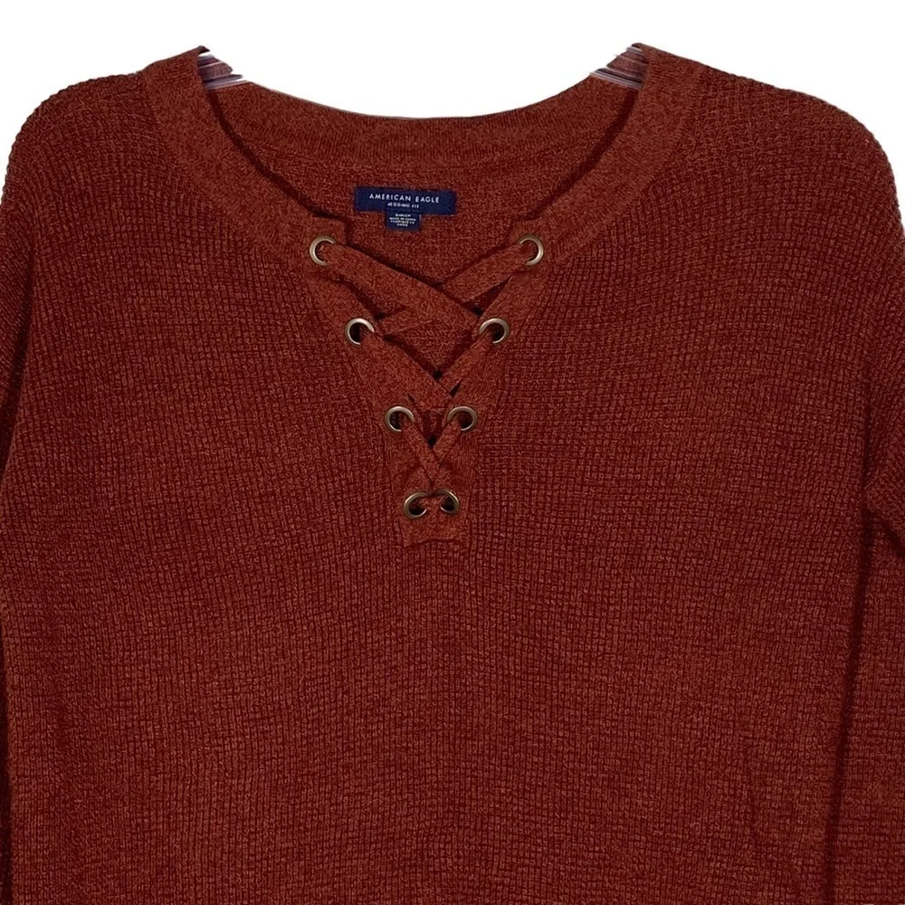 American Eagle size small jegging fit crimson rust color cross tie knit sweater